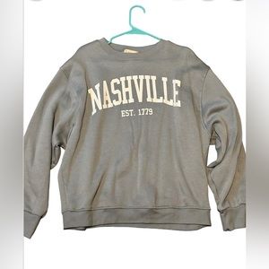 Nashville crew neck size Large. (It fits more like a medium)